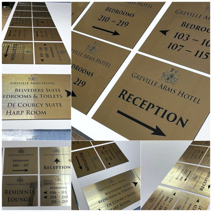 Greville Arms Hotel — engraved brass-effect wayfinding and room signage