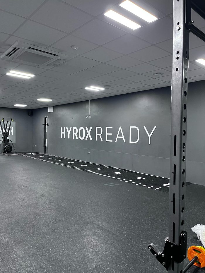 Hyrox Ready — dimensional gym wall lettering