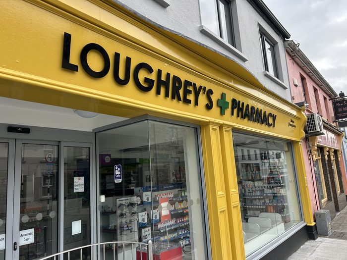 Loughrey's Pharmacy — dimensional shopfront fascia lettering